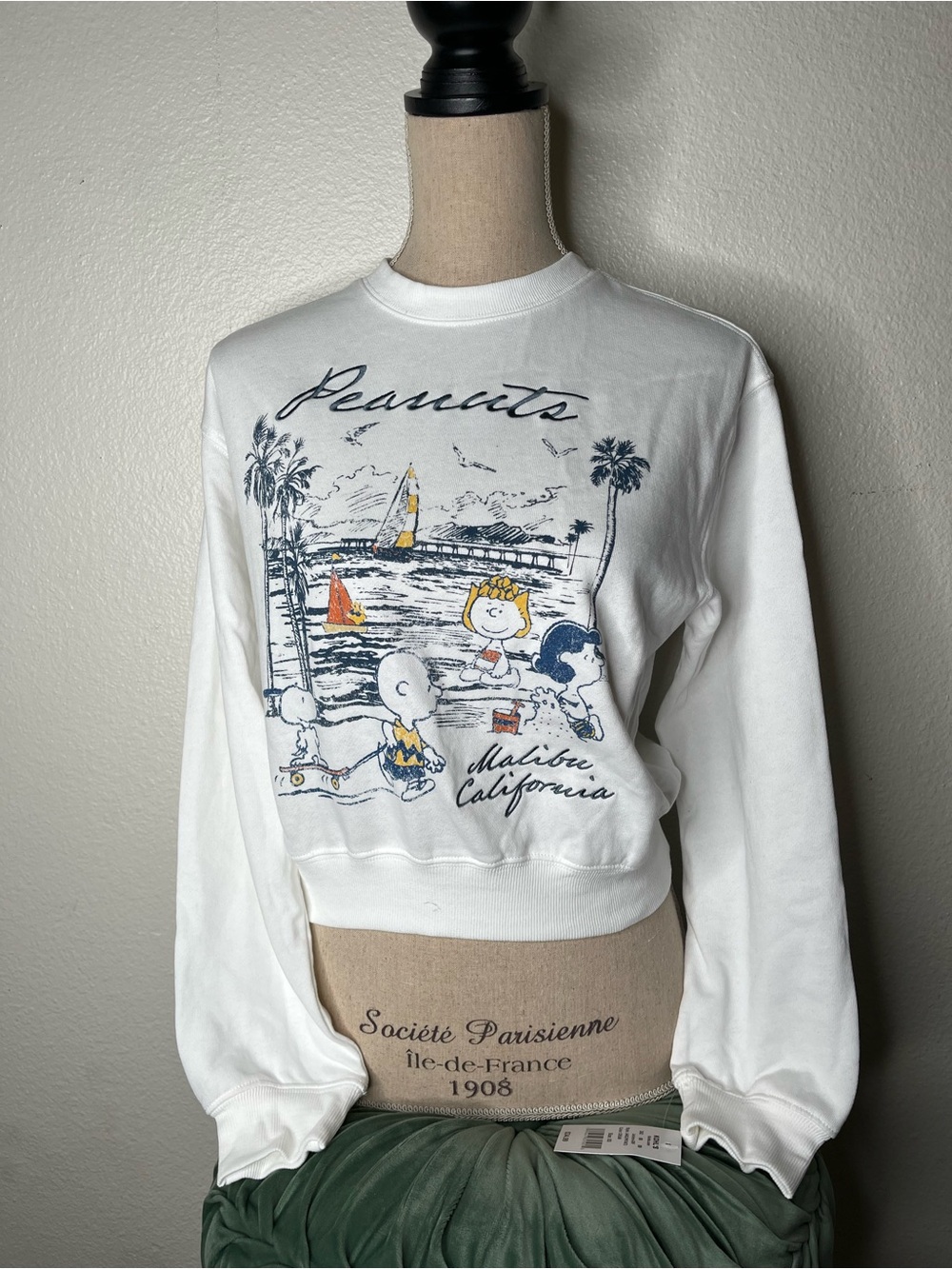 Peanuts White Crewneck Sweater with Beach Graphic
